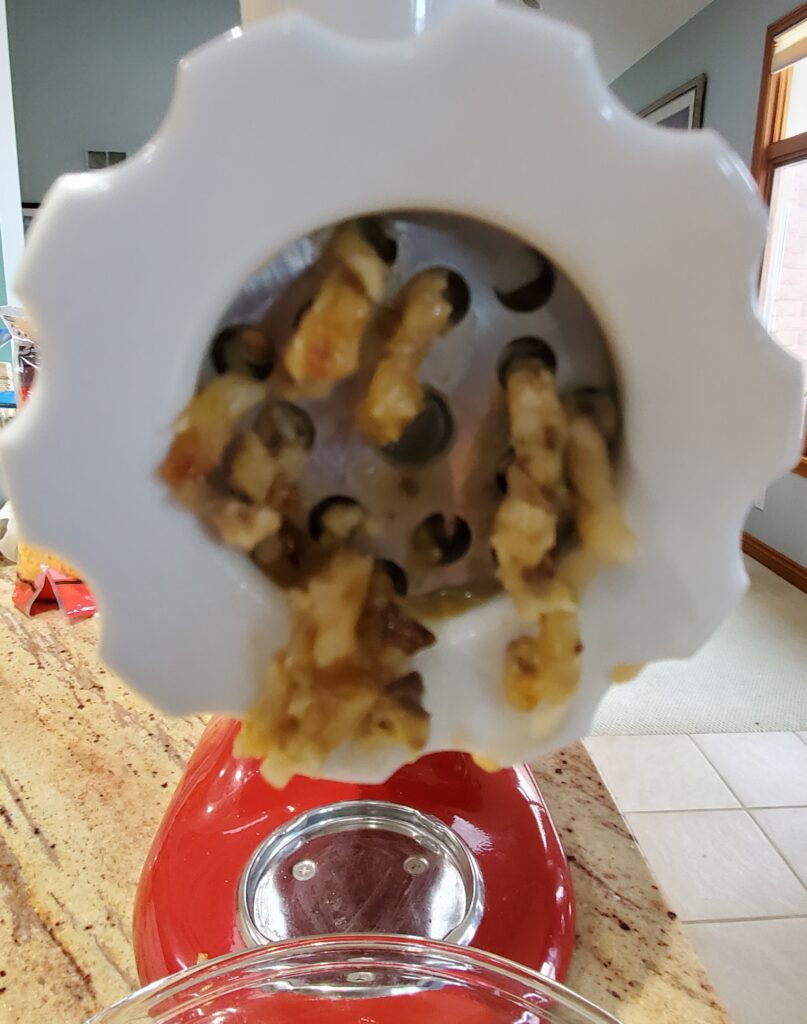 Mushroom and Sauerkraut filling in a meat grinder