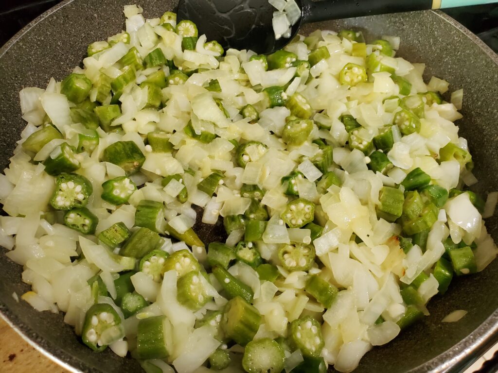 Sauté onions and okra