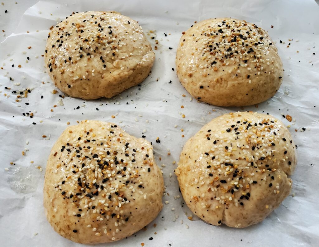 Dough balls with egg wash and everything bagel seasoning