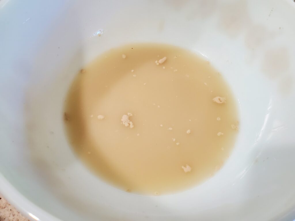 Yeast mixed with warm water and honey