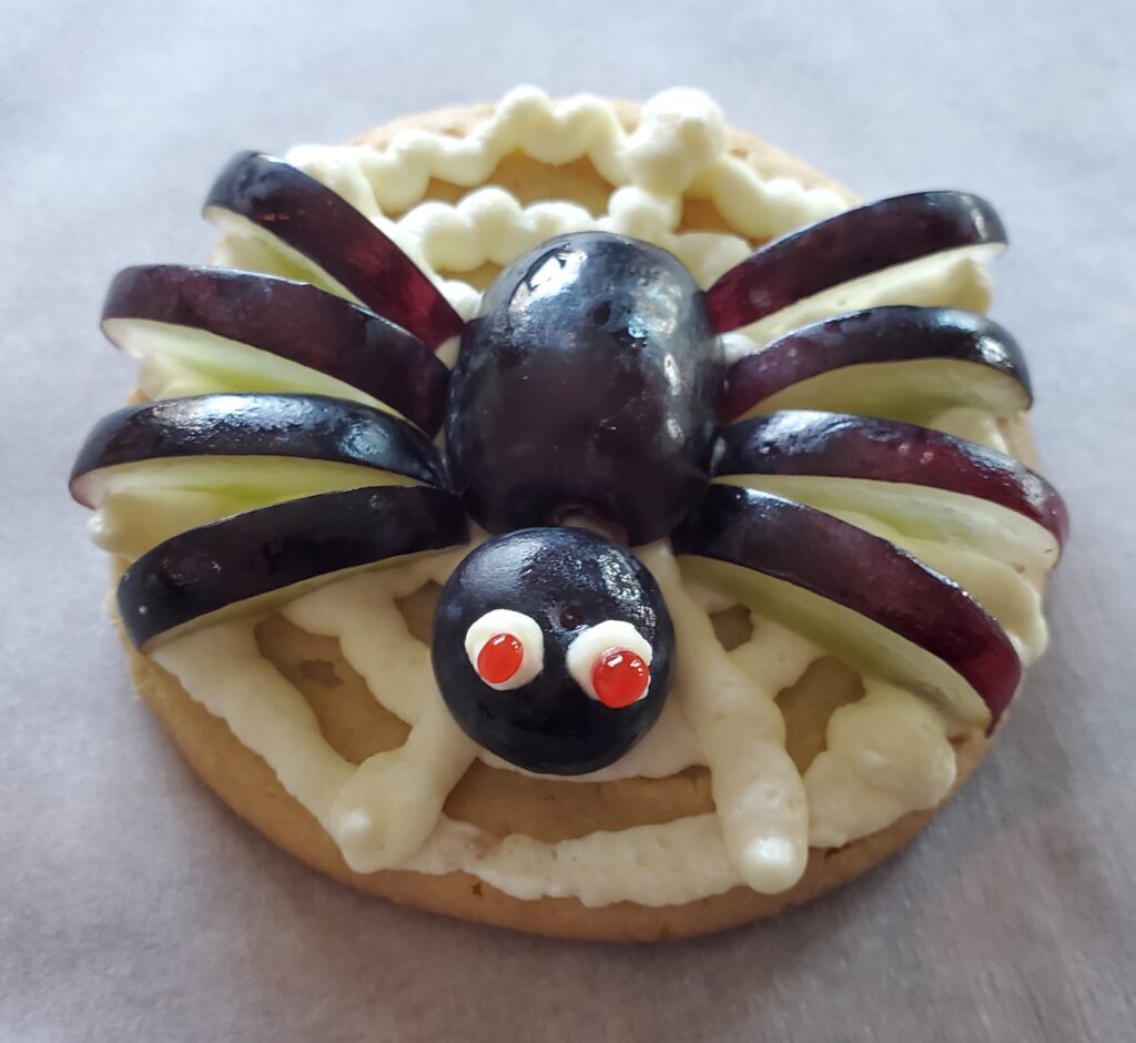 Grape spider on cookie