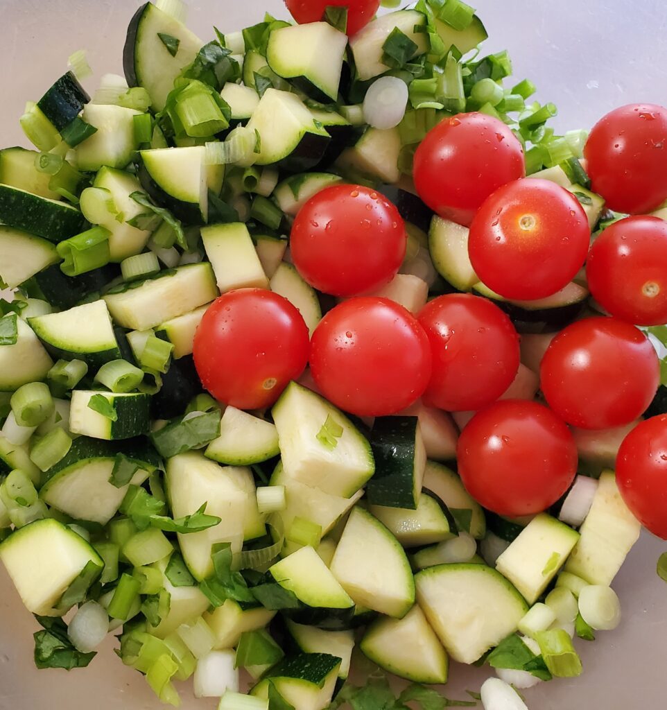 zucchini tomatoes and onions